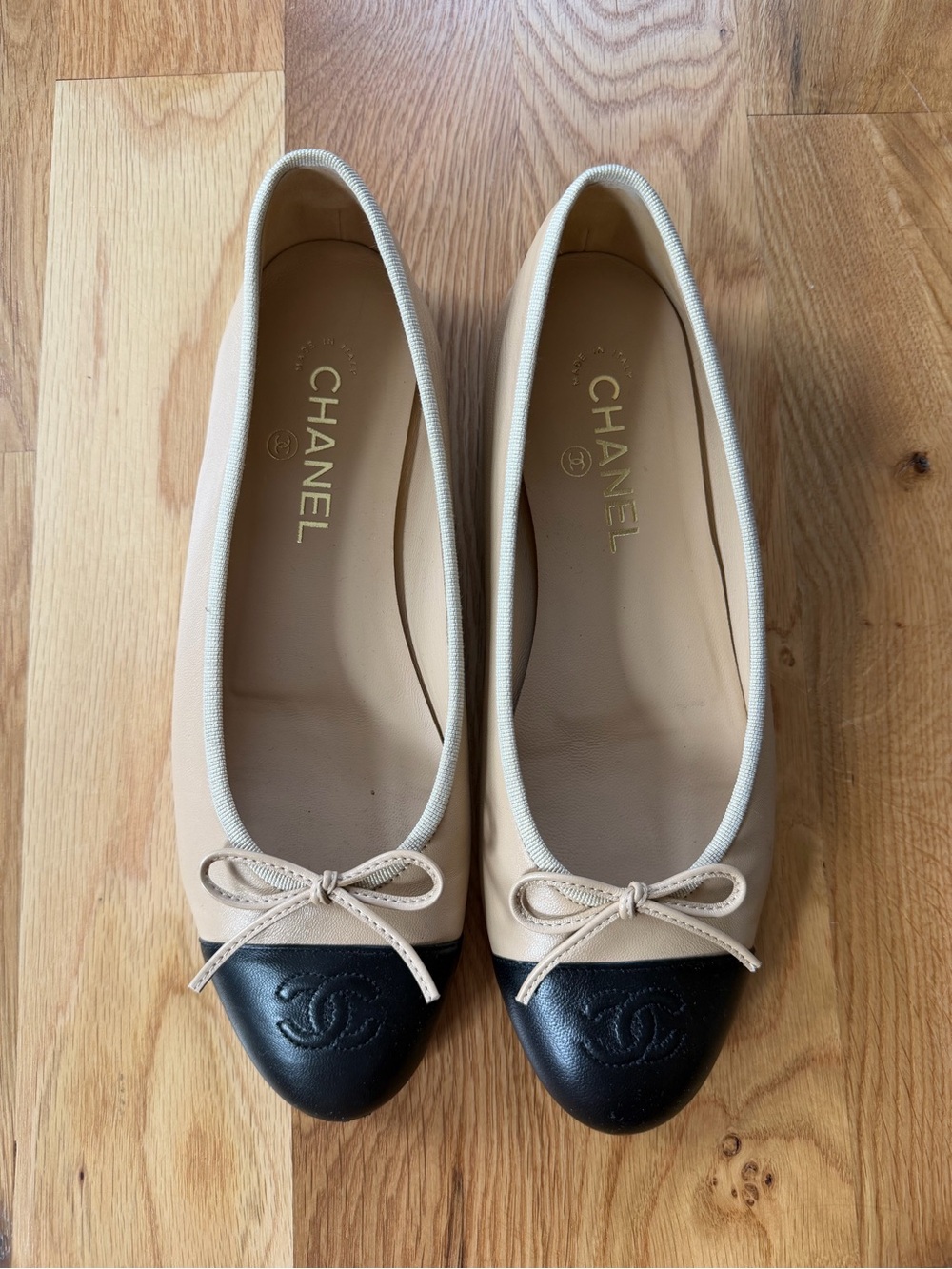 CHANEL Two-Tone Beige and Black Cap-Toe Ballet Flats